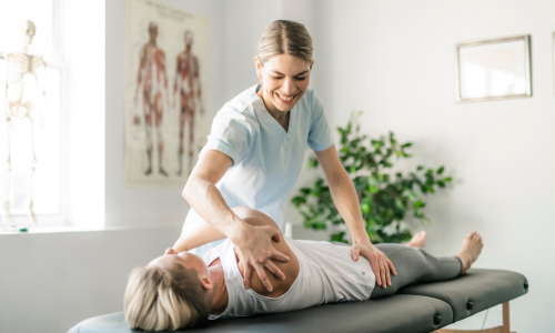 Woman receiving chiropractic care